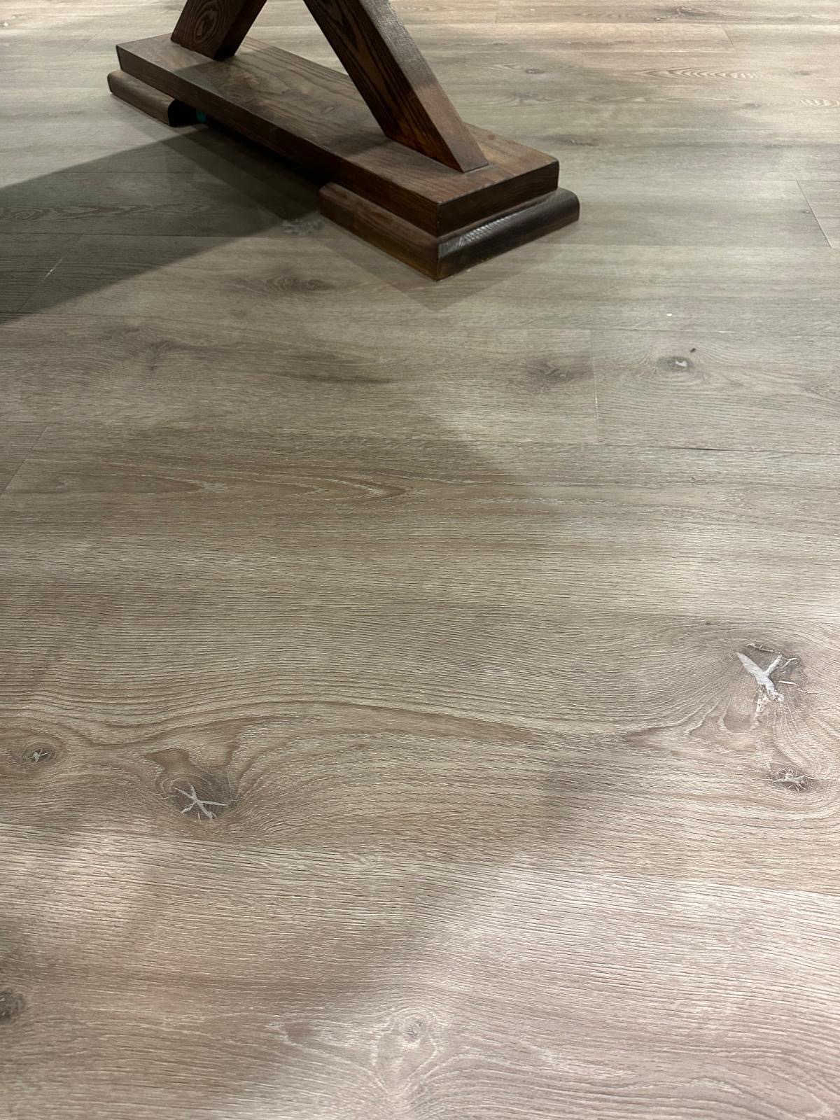 Close view of the wood-effect LVT flooring fitted in the Guildford basement