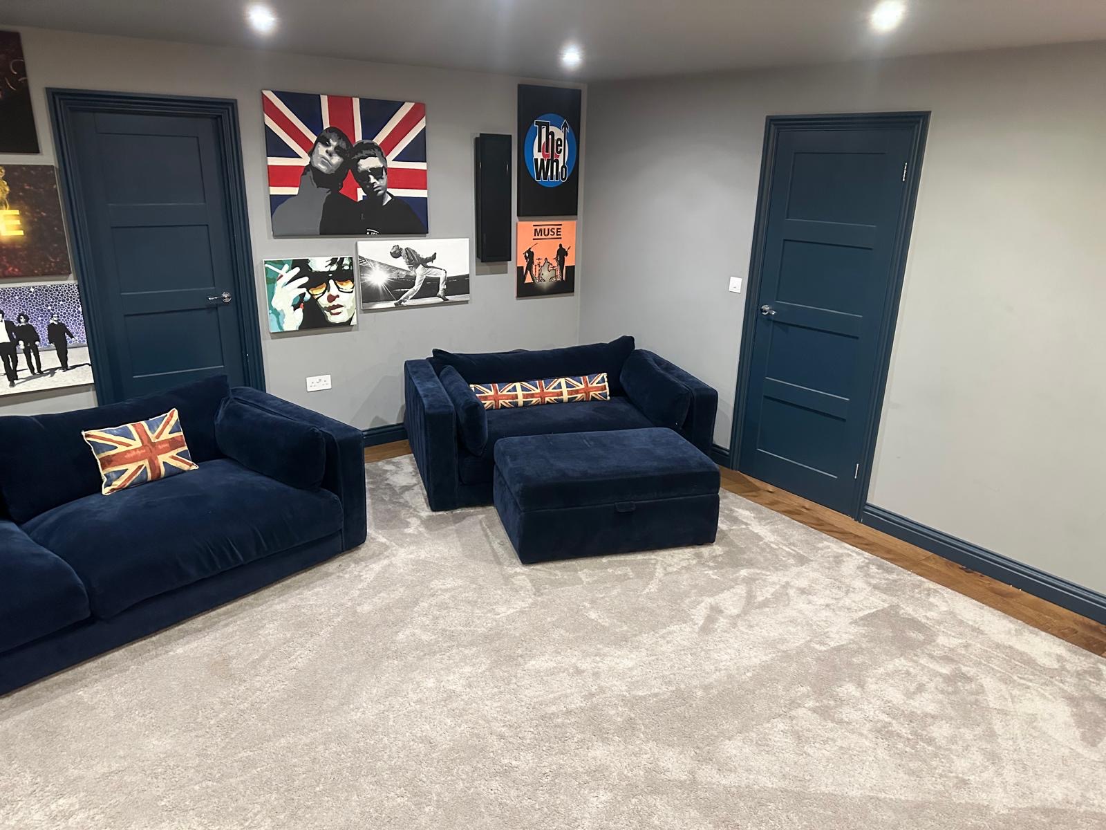 Soft patterned carpet and wood flooring in the completed Haslemere cinema seating area